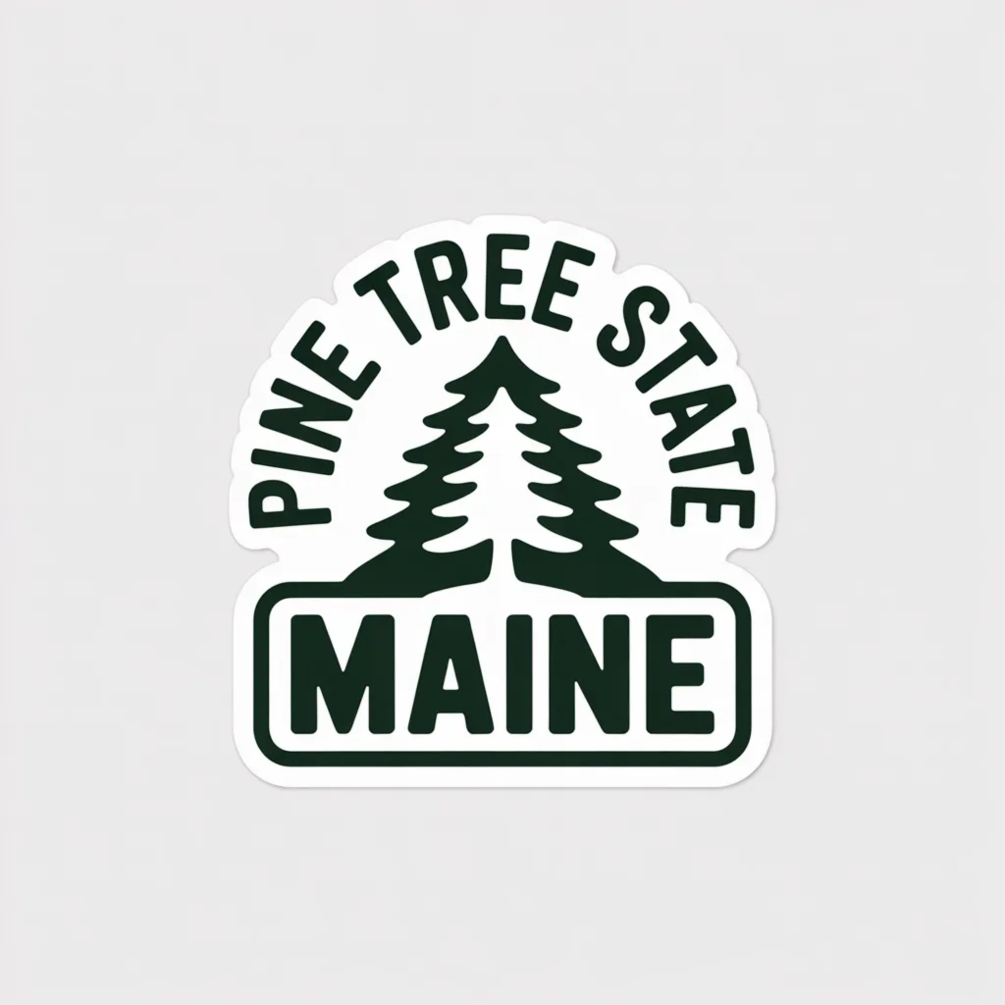 Sticker with 'Pine Tree State Maine' text and design on a light gray background